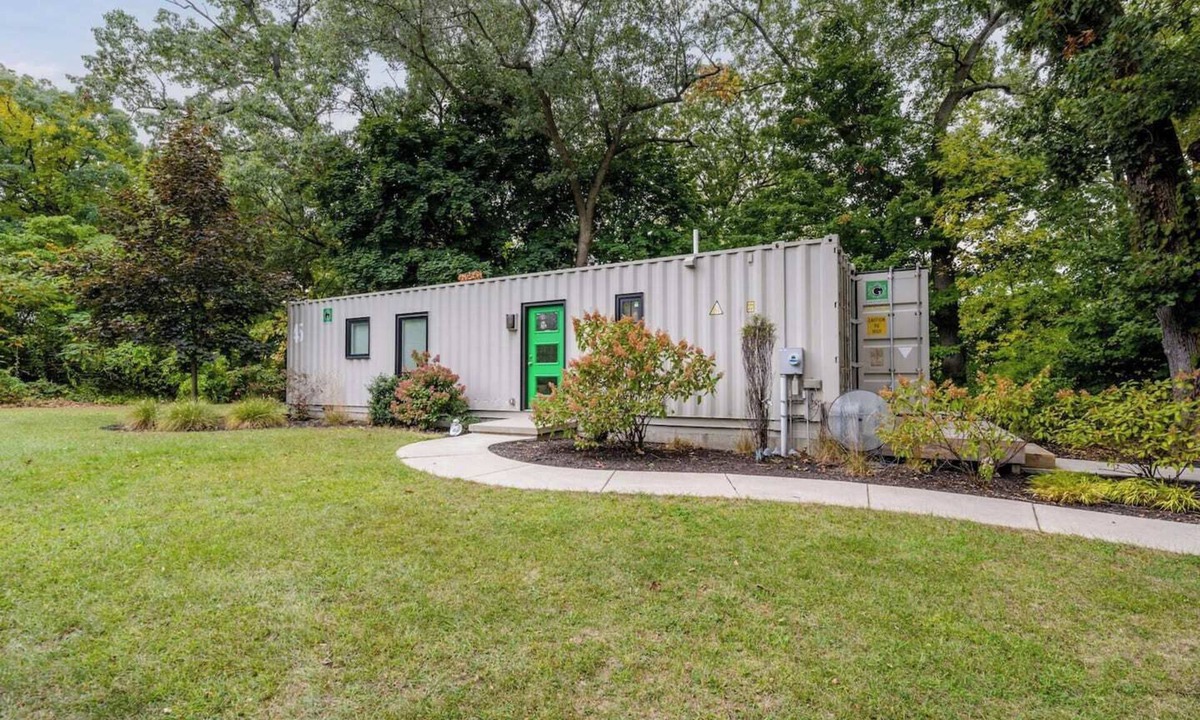 Benton Harbor Apartment | Unique container home retreat near Lake Michigan. Enjoy a peaceful, private setting with a spacious deck, firepit, and ravine views. Close to beaches, wineries, and downtown St. Joseph—perfect for a relaxing Southwest Michigan getaway.