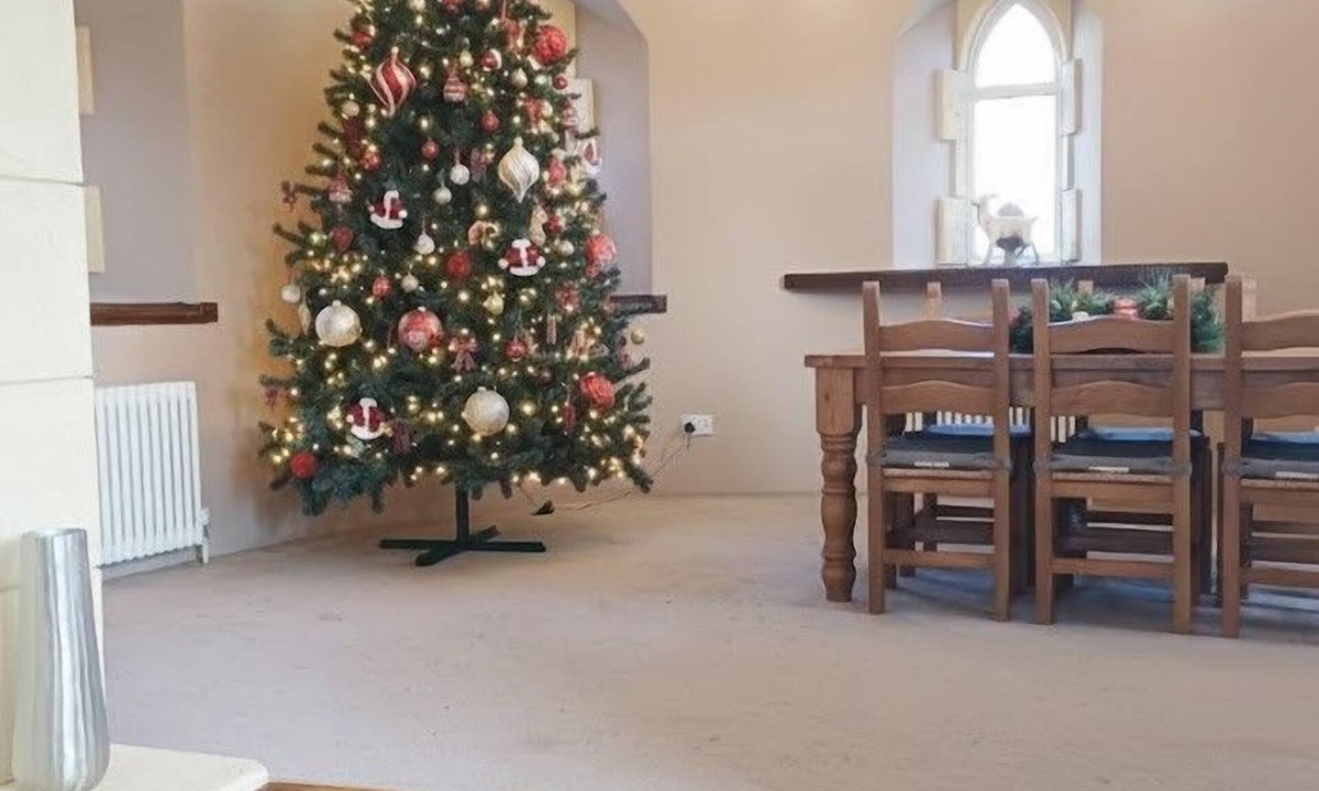 Llanddowror Cottage | Unique historic school‑house conversion with log burner