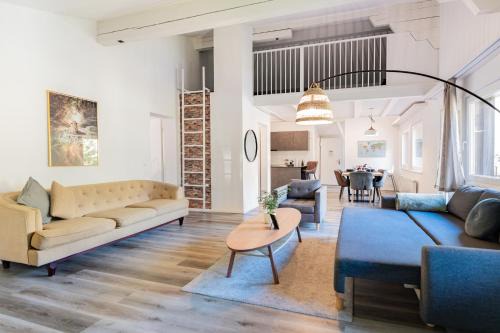 Blausee Apartment | Unique Penthouse with Gallery and Mountain View