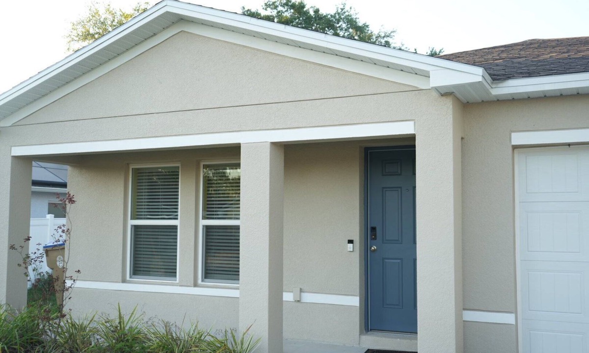 Poinciana House | Unwind in this serene thoughtfully designed home nestled in a quiet neighborhood