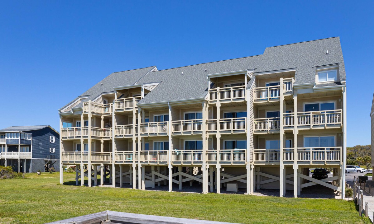 Caswell Beach Condo | Updated third-floor condo with WiFi, shared pool, balcony, W/D, & central AC