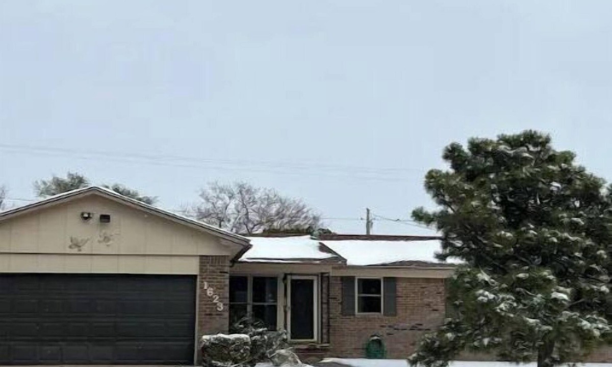 Guymon House | Updated three bedroom home across from park