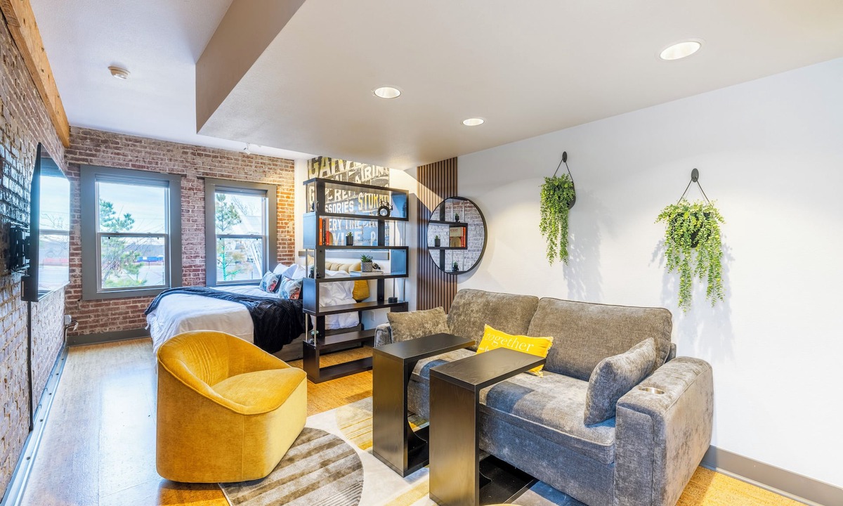 Rogers Apartment | Urban Brick Loft Studio Ride to Trails Walk to Dining, Shops & Nightlife