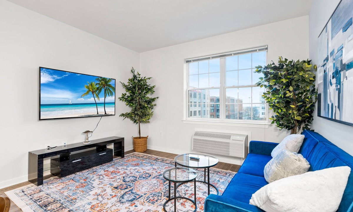 Hackensack River Waterfront Condo | Urban Elegance: 20 Minutes to NYC with Luxe Amenities- Gym and Laundry In Unit