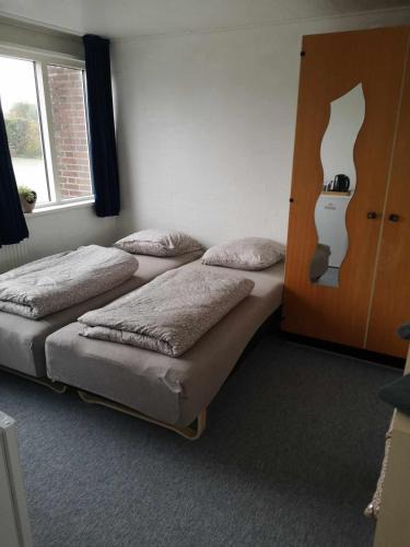 Kolding House | Værelse m minikøkken brusekabine og toilet 2 prs
