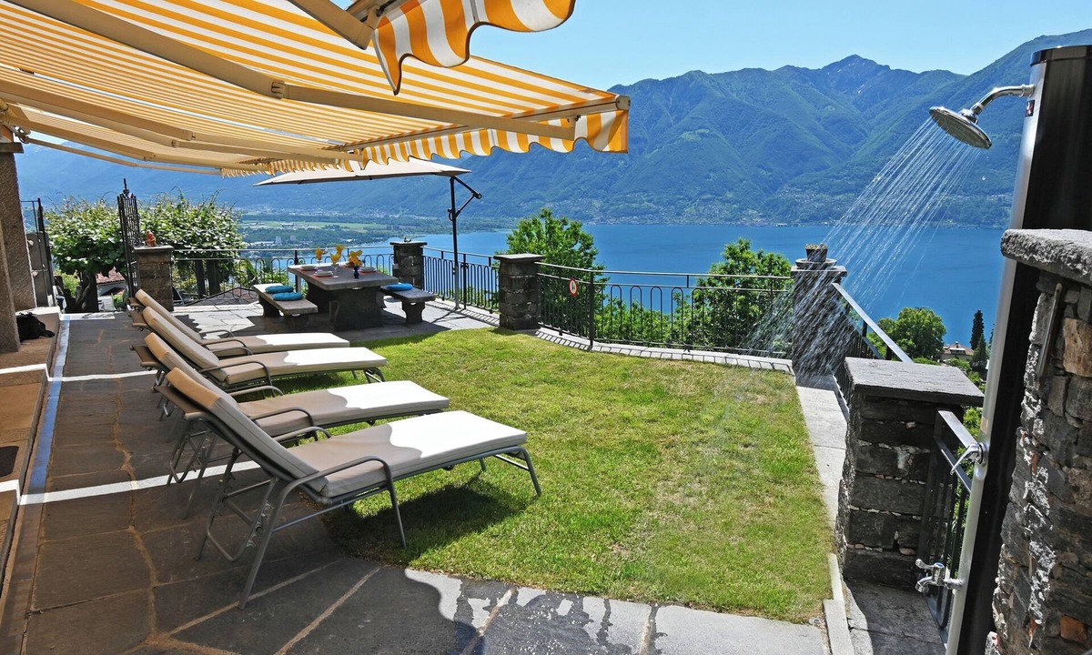 Brione sopra Minusio House | Vacation home with beautiful 180° panoramic view, detached barrel sauna, and hot