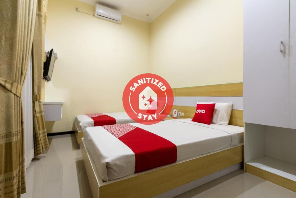 Dinoyo Hotel | Vaccinated Staff - OYO 3763 Oq Guest House Syariah