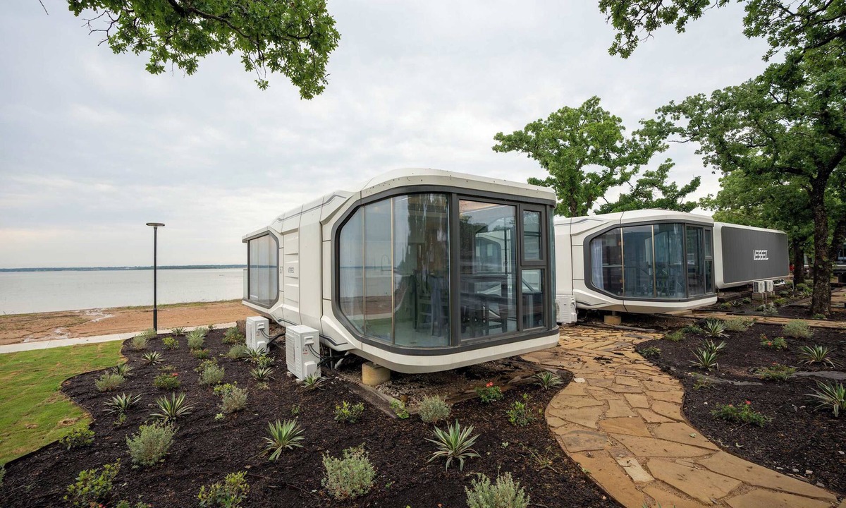 Runaway Bay Apartment | Vessel 10 - Elevated Vessel Experience | Waterfront Backyard Fast Internet