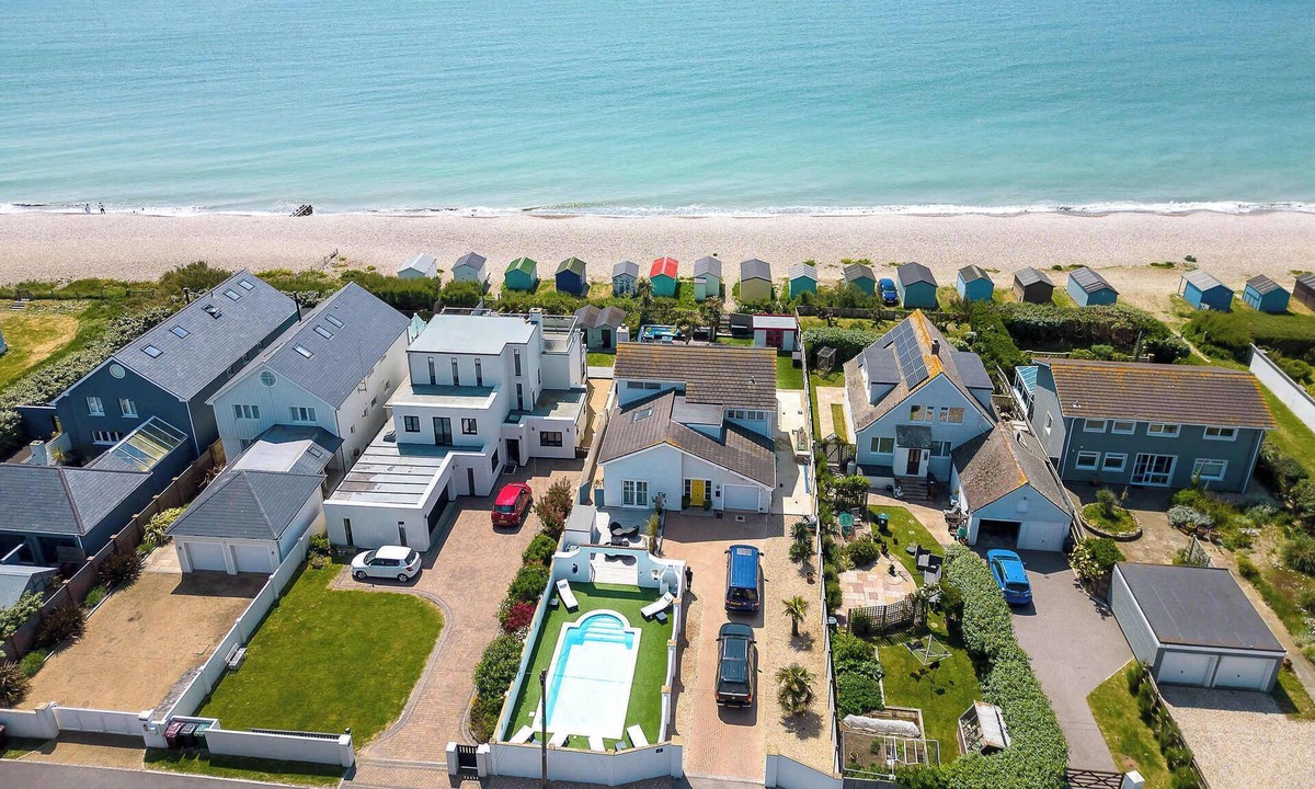 East Wittering House | Vibrant Seafront Home With Seasonal Pool