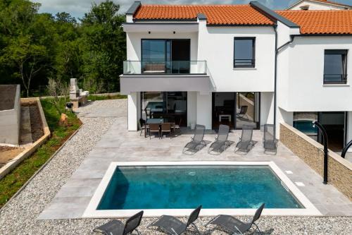 Risika Villa | Villa Lavanda -semi-detached villa with a pool and a panoramic view, close to a sandy beach- by TRAVELER tourist agency Krk