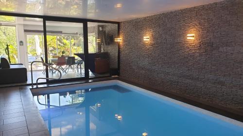 Hardelot-Plage Apartment | Villa les Agapanthes avec piscine et SPA chauffée dans votre appartement