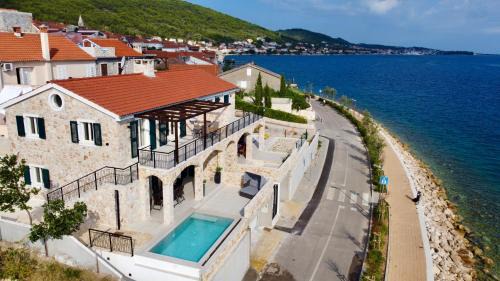 Kali Apartment | Villa Ocean View of Kali - Erste Meerreihe mit beheizbarem Pool