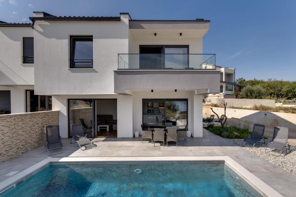 Risika Villa | Villa Rosemary -semi-detached villa with a pool and a panoramic view, close to a sandy beach - by TRAVELER tourist agency Krk