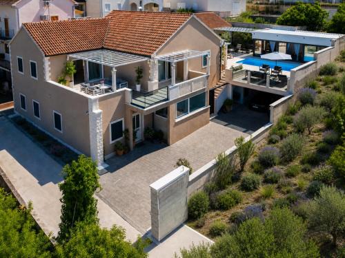 Milna (Brac) House | Villa TM with private heated pool, poolhouse & private garage