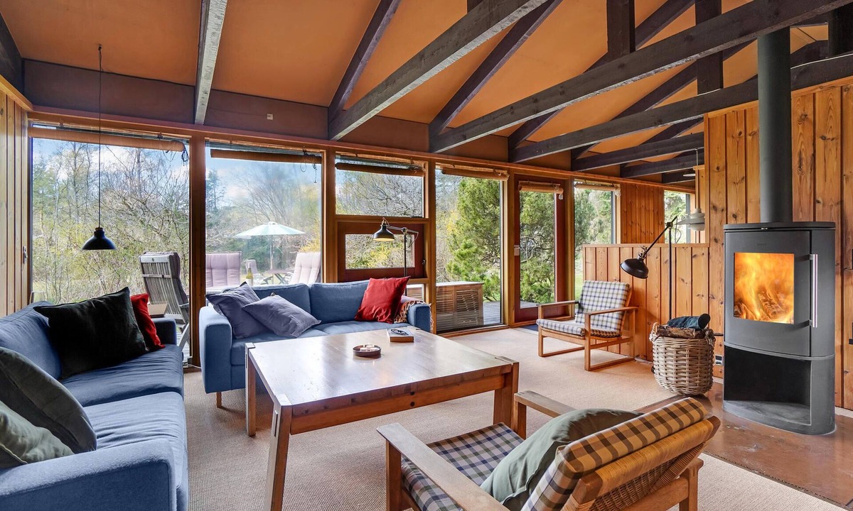 Rrvig House | Visit this charming wooden house surrounded by wonderful nature.