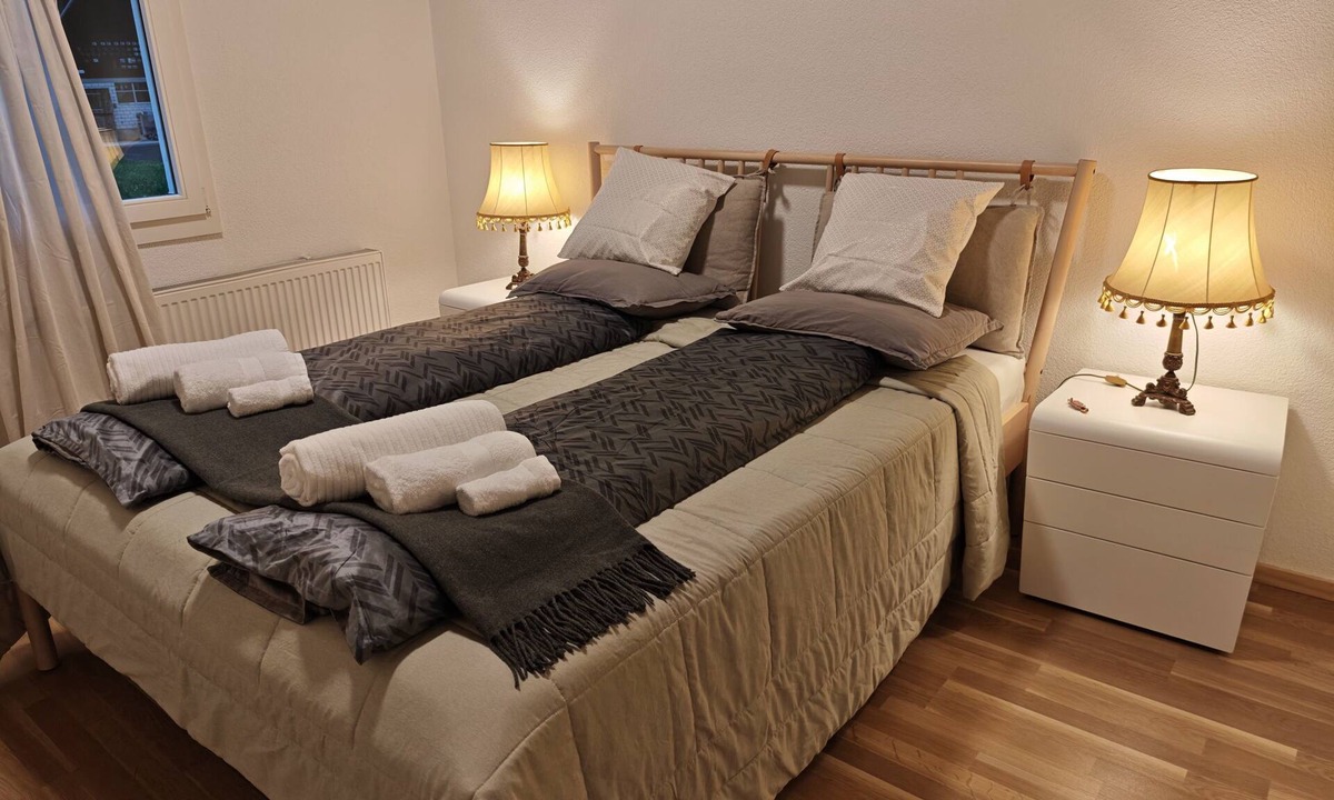Lungern Condo | “Wake Up to Lake & Mountain Views with a Magical Summer Waterfall”