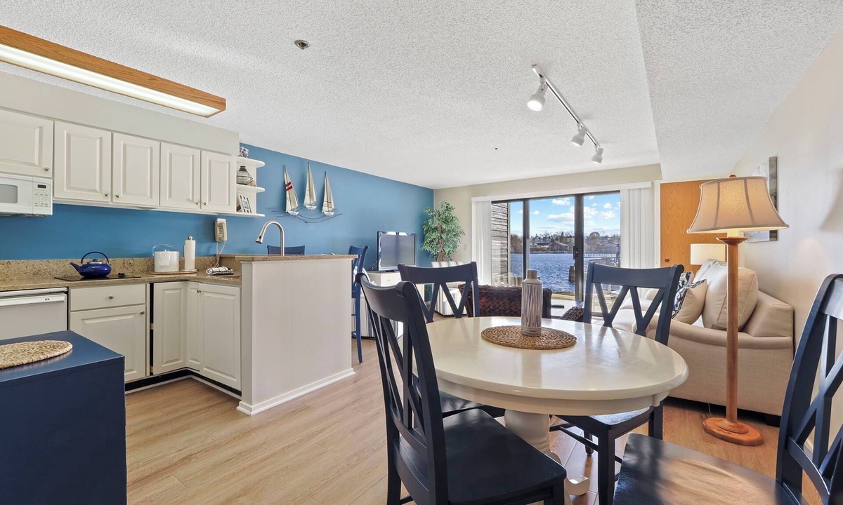 Charlevoix Condo | Waterfront Access| Pool, Hot Tub, Sauna | Sleeps 4