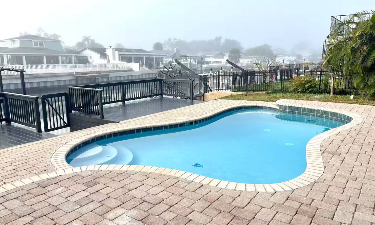Bay Crest Park Apartment | Waterfront Escape: Pool, Space & Style