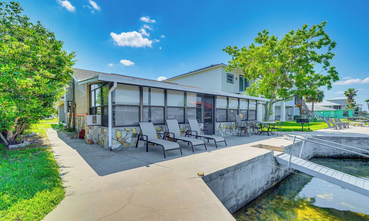Spring Hill Cottage | Waterfront Hernando Beach Home w/Dock & Hot Tub!