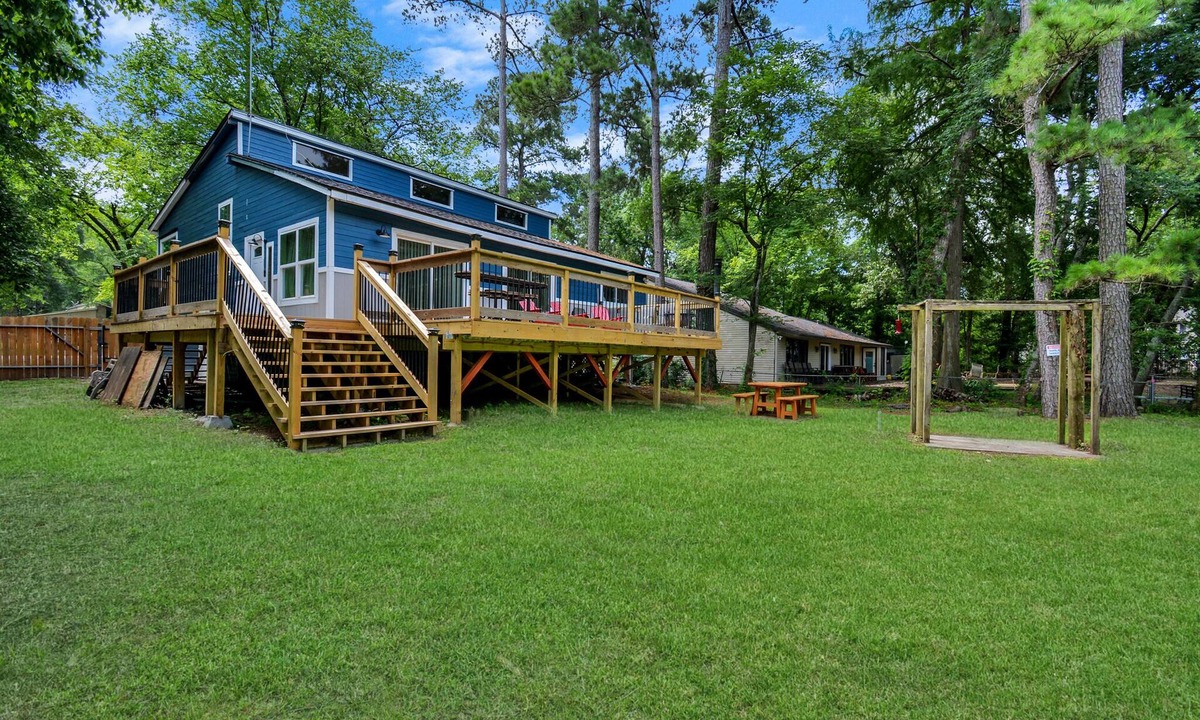 Montgomery House | Waterfront house with a large deck and dock for boat or fishing