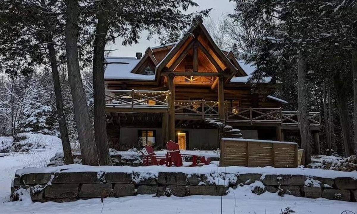 La Minerve Cottage | Waterfront Log Cottage with Hot Tub and Sauna