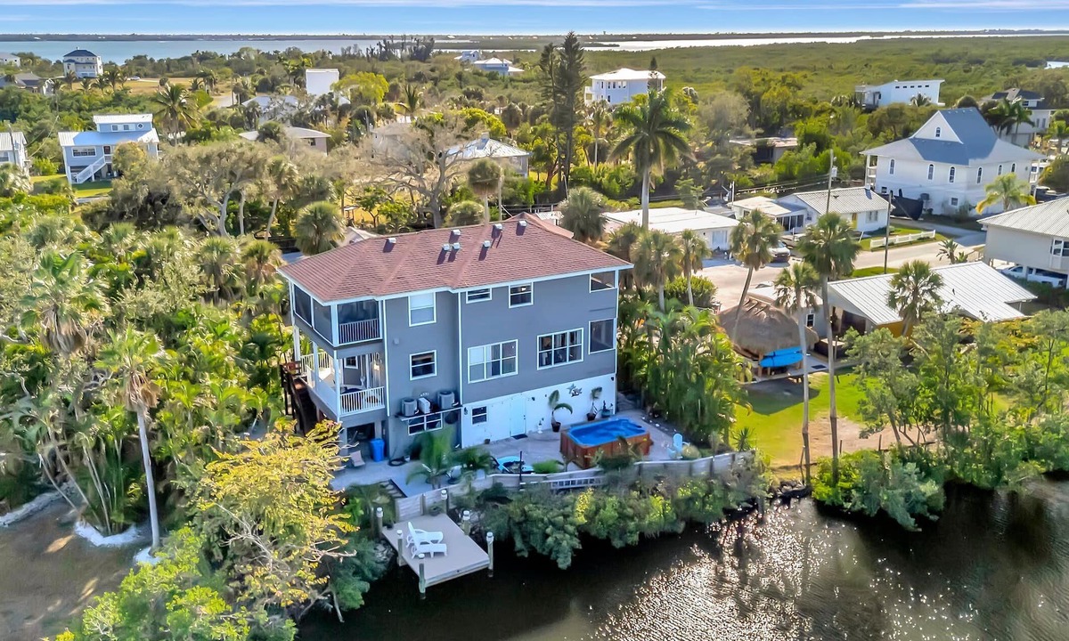 Palmetto House | Waterfront Mansion & Elevator 4 Balconies, Hot Tub