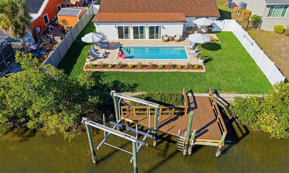 Apollo Beach House | WaterFront Oasis with Saltwater Pool & Dock