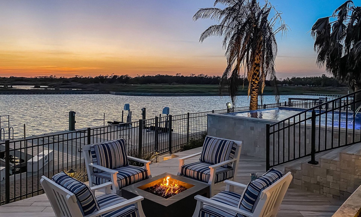 Rockport House | Waterfront paradise with private pool, dock, poolside TV & multi-TV game room