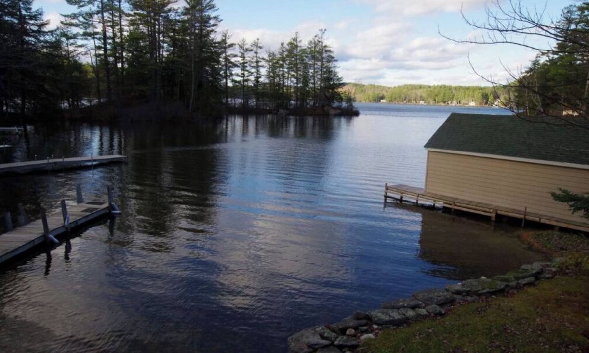 Sunapee House | Waterfront property on pond with private dock .