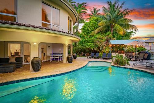 Oakland Park House | Waterfront Retreat: 7BR Villa with Pool Firepit