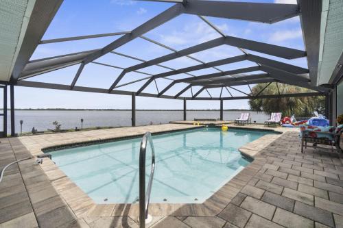 Gulf Cove House | Waterfront Retreat with Pool Hot Tub and Dock Access