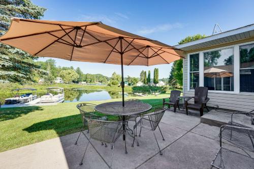 Reed City House | Waterfront Retreat w/Dock & Yard in Reed City!