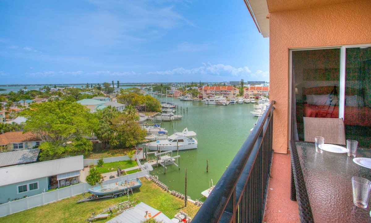 Madeira Beach Condo | Waterfront Top Unit w/Marina. Across from the Beach. Spacious w/2 Private Balconies, Pool & Hot Tub