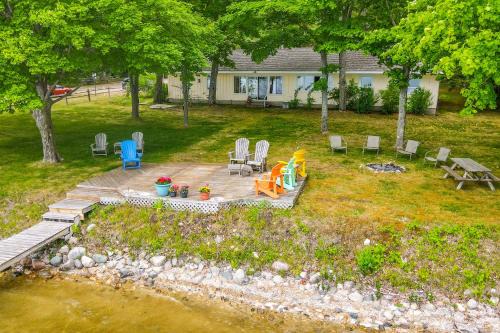 Central Lake House | Waterfront Torch Lake Cottage w/Dock & Fire Pit!