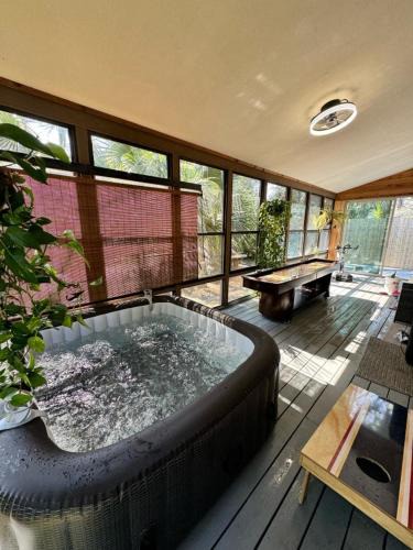Butler Beach Villa | Waterfront Zen-Dock, Paddleboards, Jacuzzi & Games