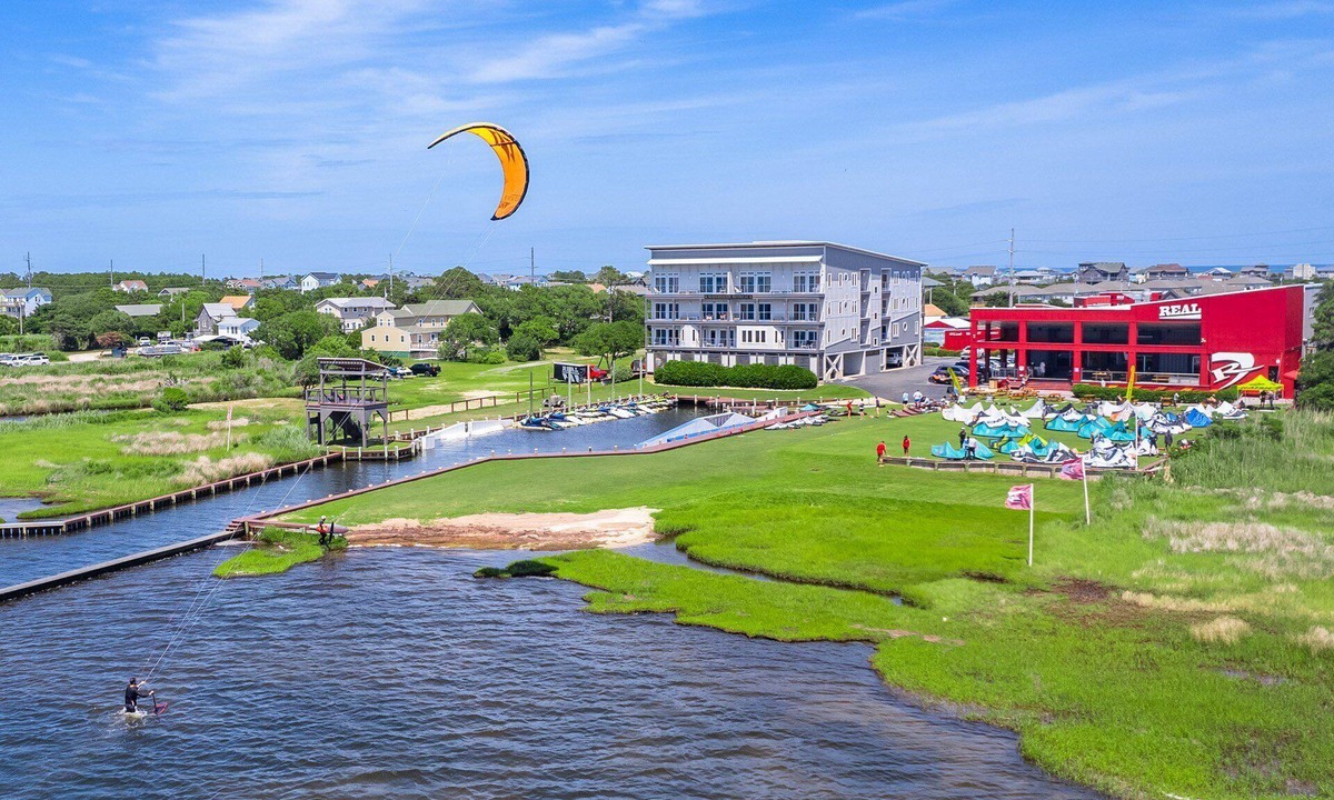 Waves Condo | Waves OBX 2BR Garden View Suite - Full Water Launch Access + Gear Storage