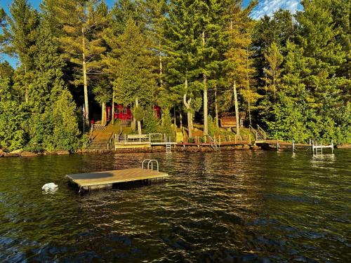 Lyon Mountain House | Well-appointed Adirondack cabin directly on 9-mile lake