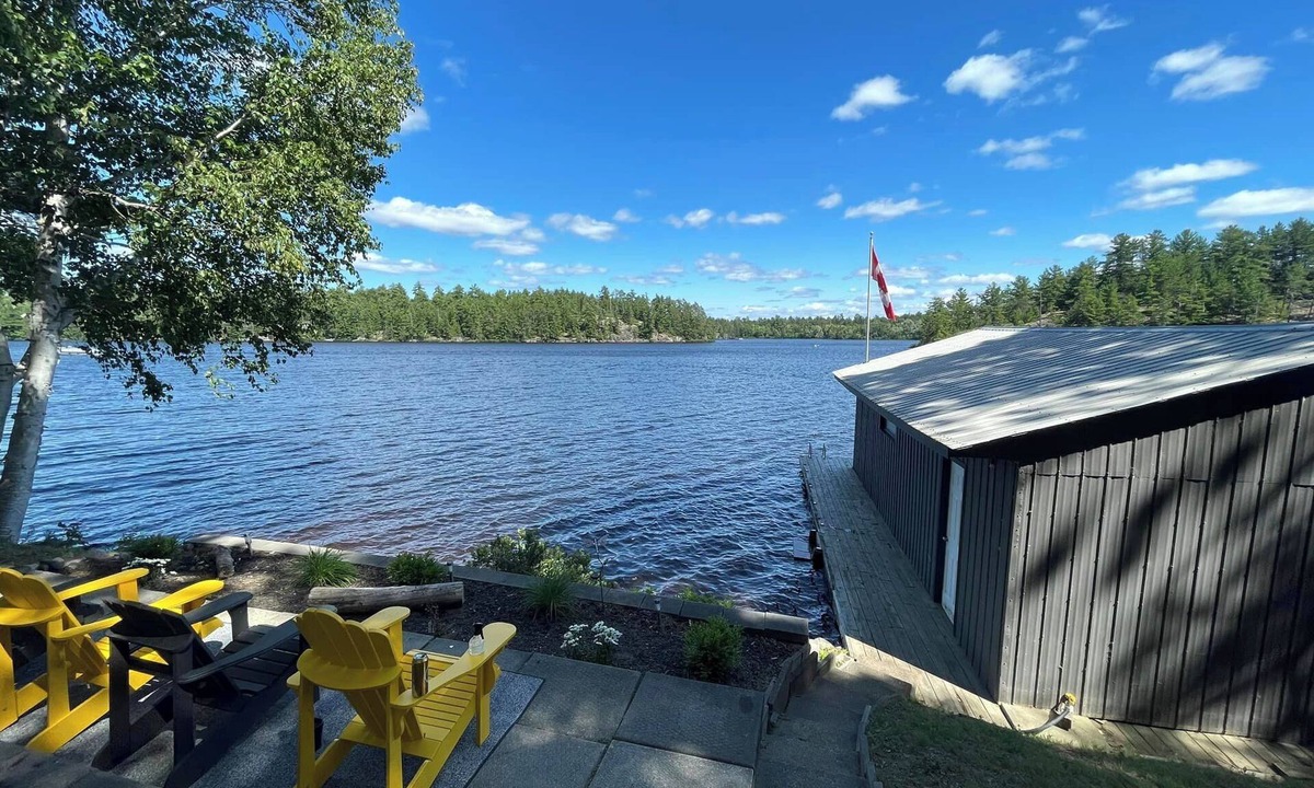 St. Charles Cottage | West Arm cottage with panoramic views, boathouse