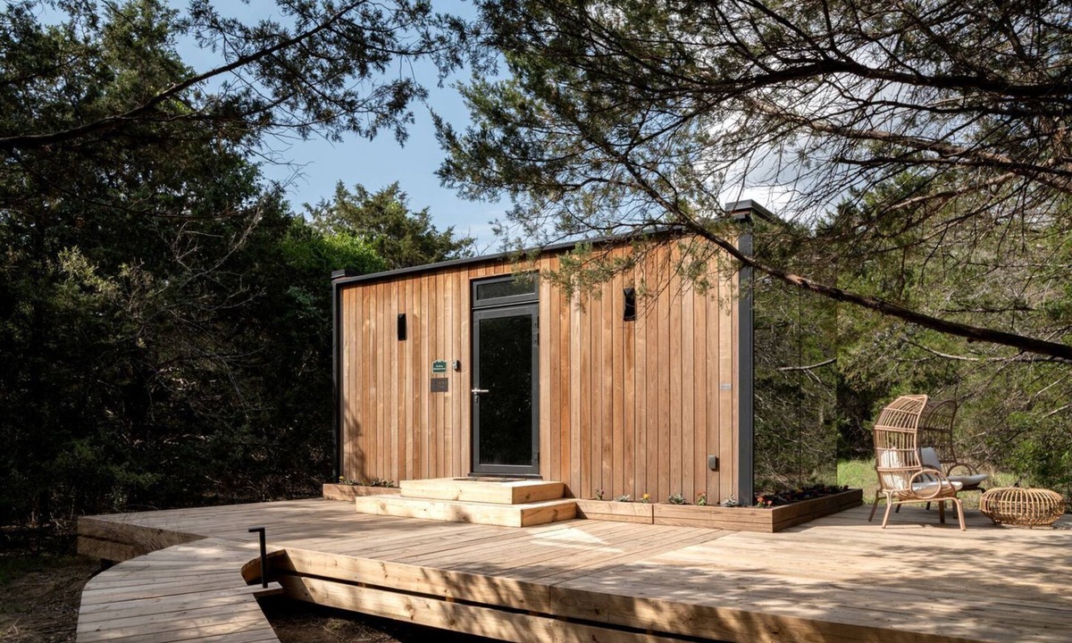 Bastrop Cabin | Whimsical Flower-Inspired Mirror Cabin by the Lake in the Enchanted Forests of Texas