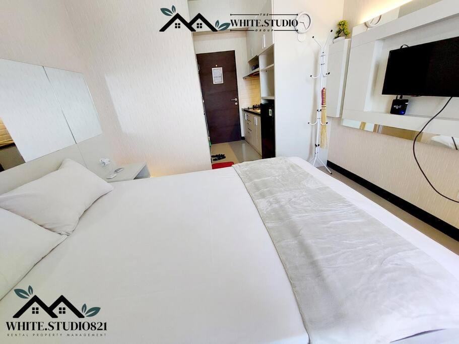 Waru Apartment | White Studio Group Surabaya - WS 821 at Amega Crown Residence