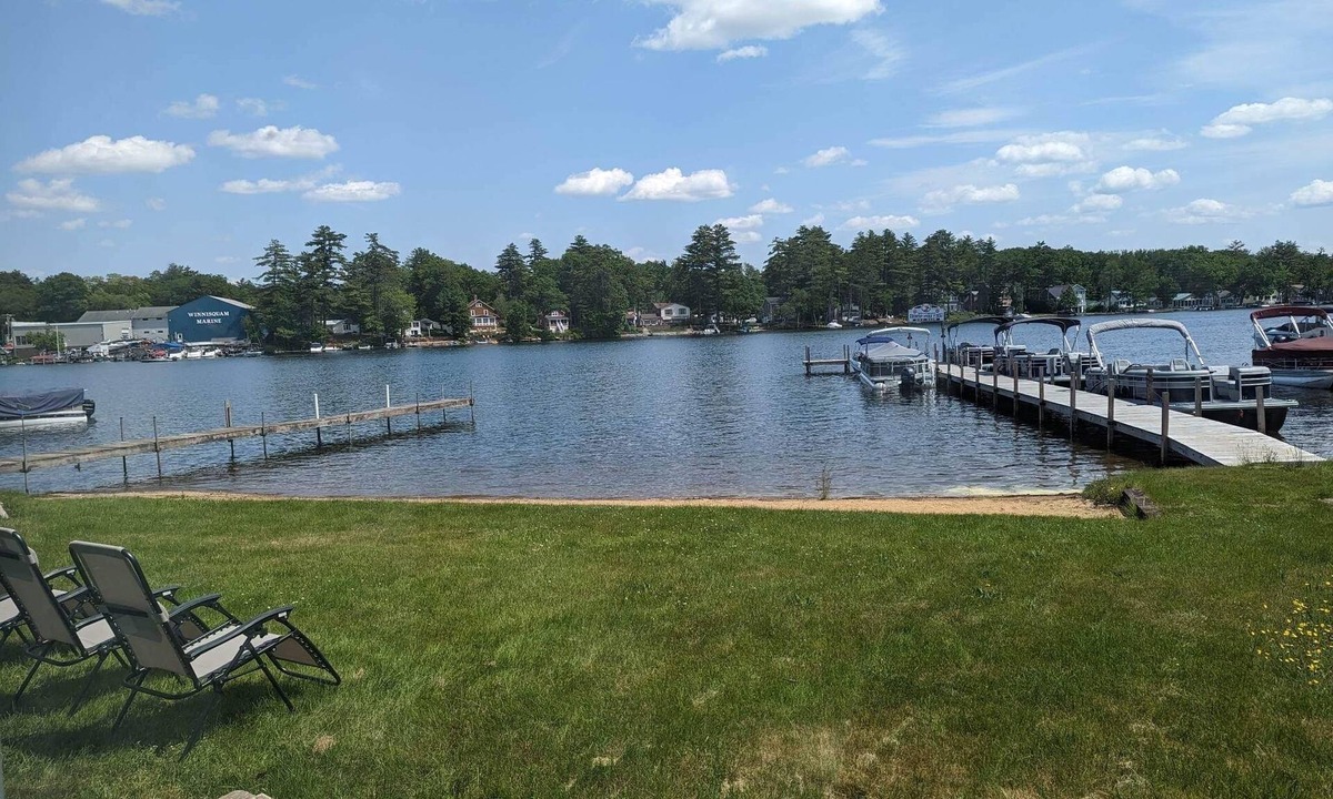 Winnisquam House | Winnisquam Lakeside Funky Ski Chalet w-Sandy Beach & Boat Docks