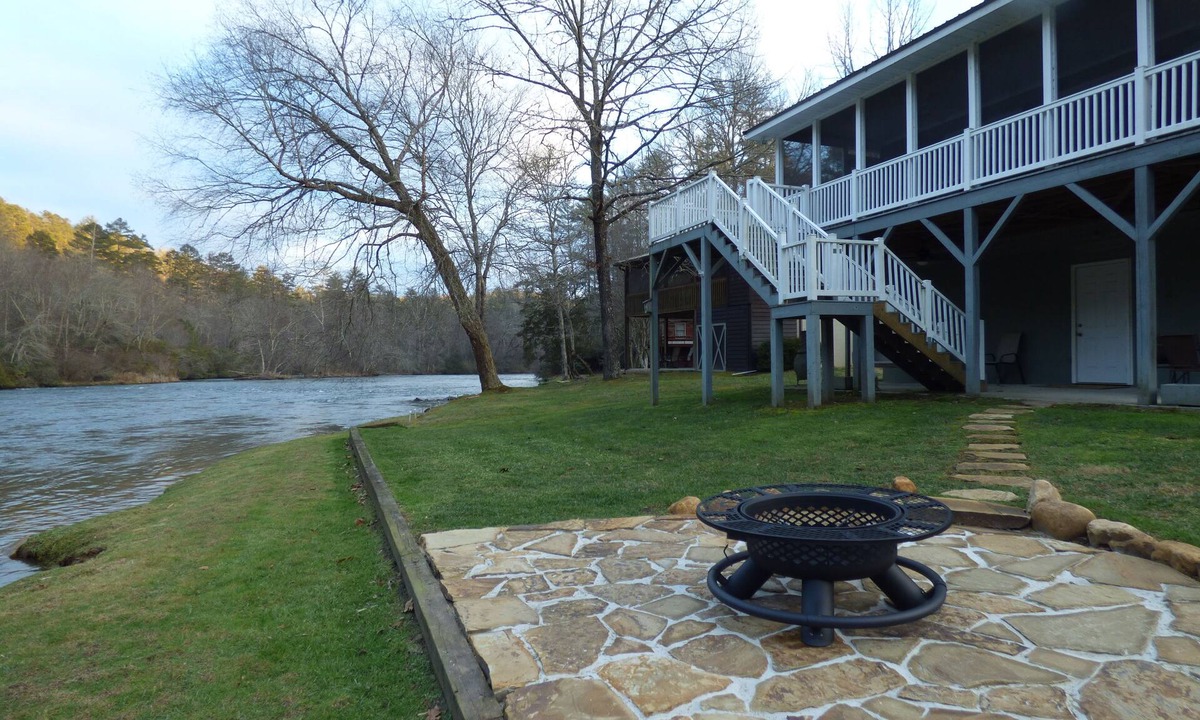Murphy House | Winter in the mountains, fishing by the fire pit. Murphy and the Casino nearby.