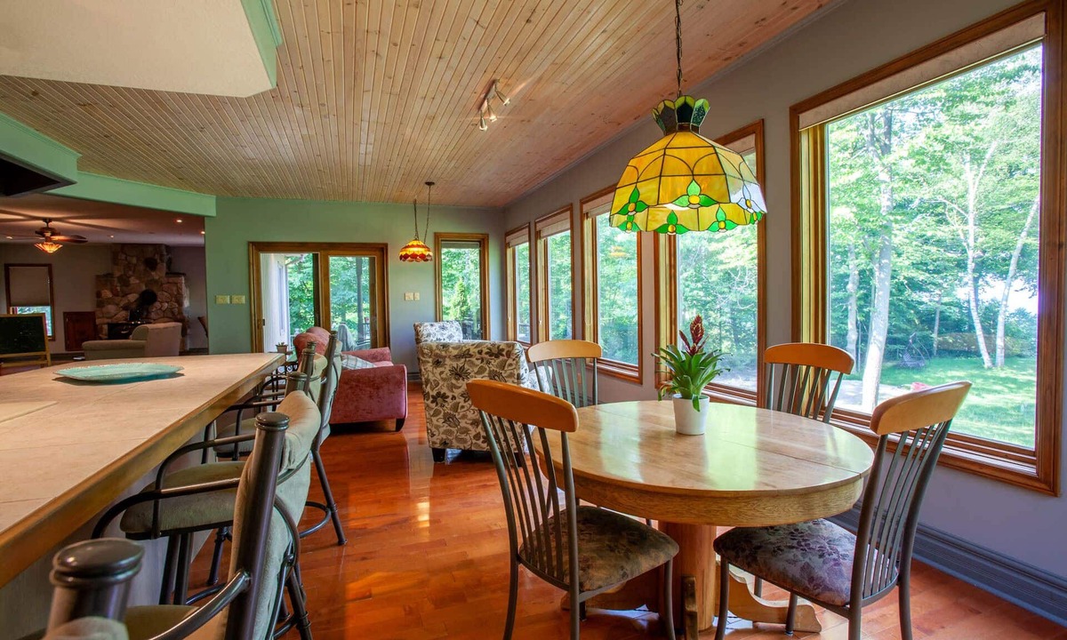 Central Huron Cottage | Woodland Retreat, King Bed, Private Lake Access