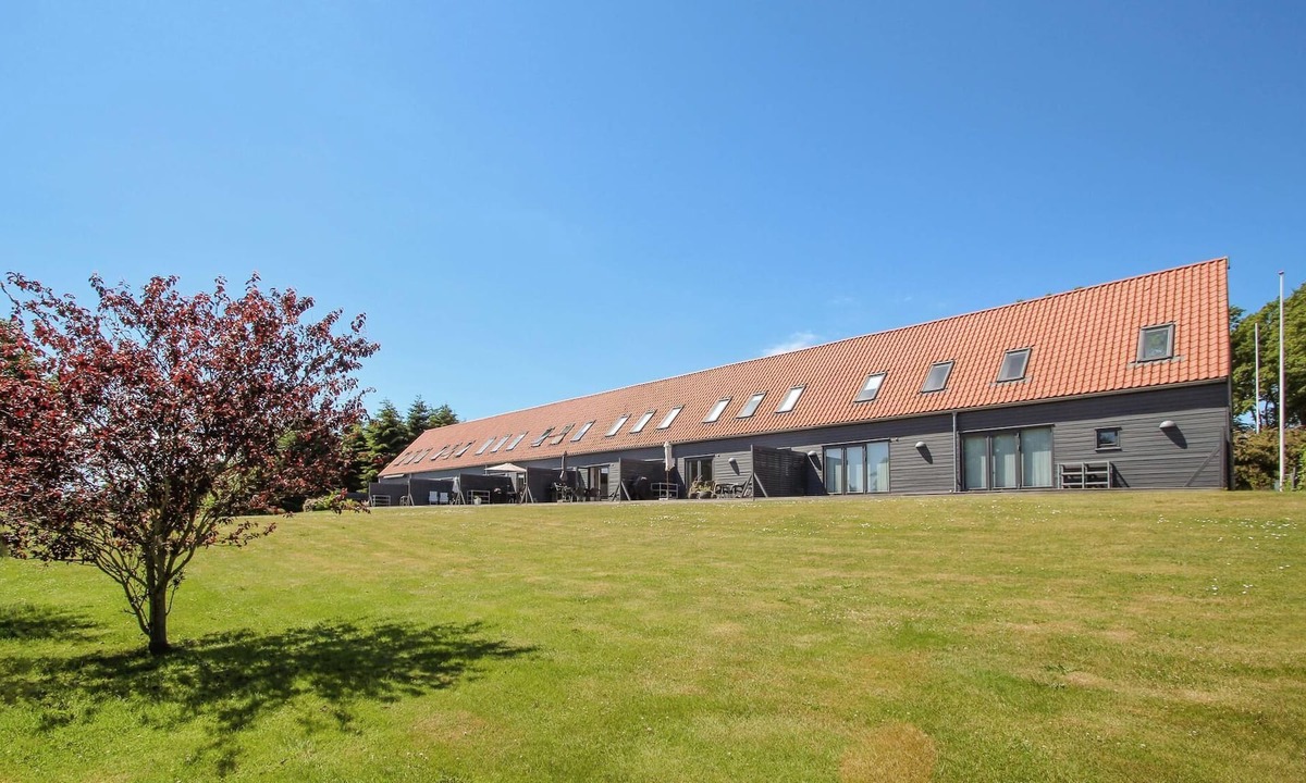 Langemark Apartment | You dream of a vacation with a view over green meadows? Then this vacation apartment on the golf cou