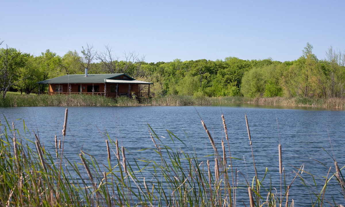 Fittstown Cabin | Your own private lakefront log cabin on a 1155 acre ranch.