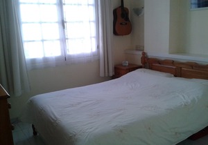 1 bedroom apartment with balcony overlooking superb communal pool and gardens