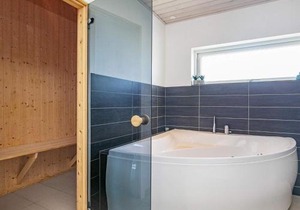10 person holiday home in L kken