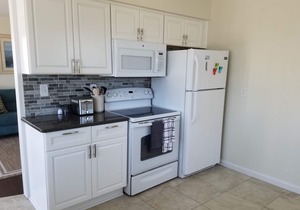 2nd Floor/Spacious deck to enjoy your sunset evenings after the beach, which is only a 3 block walk.