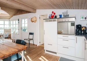 4 person holiday home in Grenaa