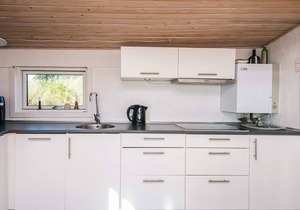 4 person holiday home in Grenaa